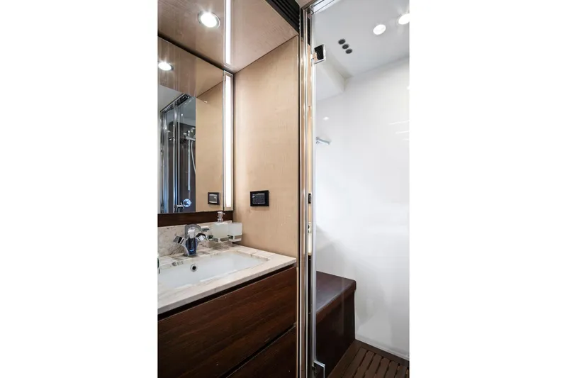 Gratitude Yacht Photos Pics Luxurious bathroom interior of 2017 Azimut 72 Flybridge yacht, featuring modern sink and shower.