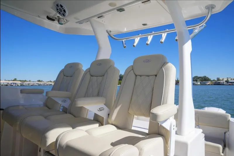  Yacht Photos Pics Luxurious seating on 2019 Regal 33 SAV boat with scenic water view.