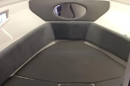 Ready For Delivery! Yacht Photos Pics 2025 Hanover 305 Outboard interior, featuring sleek black and orange design with comfortable seating.