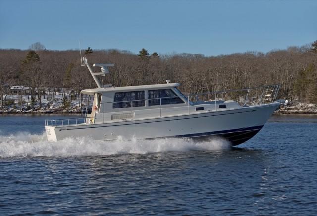 Designed by Robert Ullberg, this Lyman-Morse 65' express sport