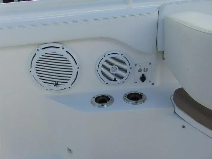  Yacht Photos Pics Edgewater 368 CC 2016 boat speakers and controls on white panel.