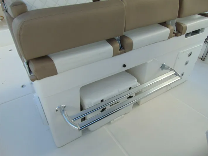  Yacht Photos Pics 2016 Edgewater 368 CC boat seating with storage and chrome rail.