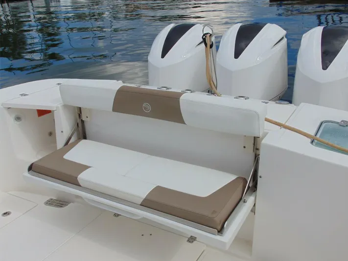  Yacht Photos Pics 2016 Edgewater 368 CC boat with foldable seating and triple outboard engines.
