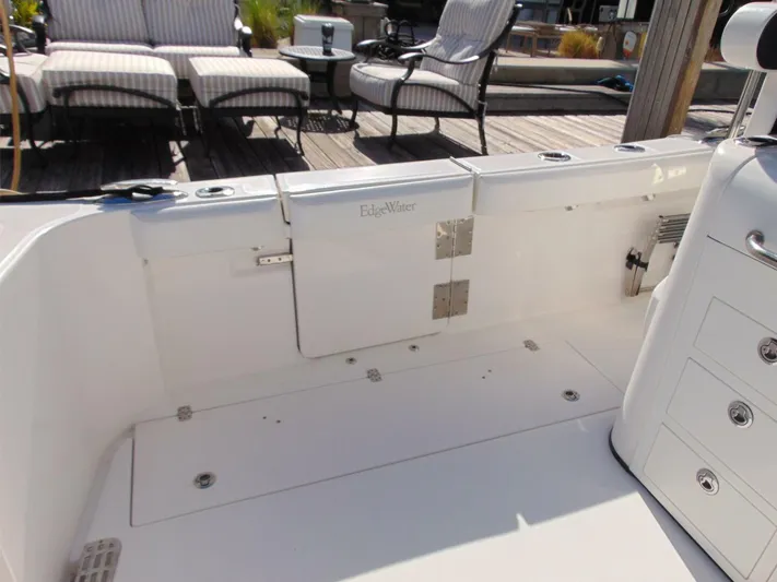  Yacht Photos Pics 2016 Edgewater 368 CC boat deck with seating and storage compartments.