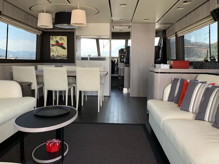  Yacht Photos Pics Luxurious interior of 2019 Azimut Magellano 66 yacht with modern furnishings and elegant decor.
