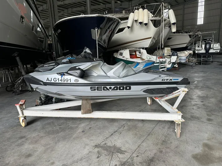  Yacht Photos Pics Jet ski in storage with Azimut Magellano 66 yacht, 2019 model, in the background.