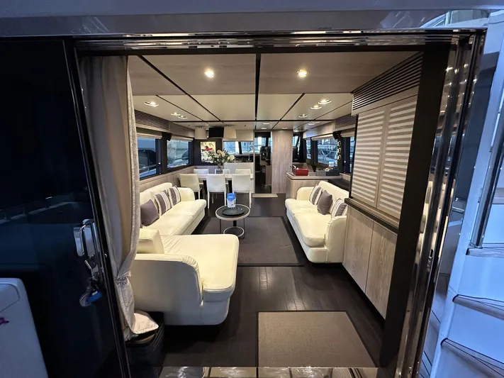  Yacht Photos Pics Luxurious interior of 2019 Azimut Magellano 66 yacht with elegant seating and modern decor.