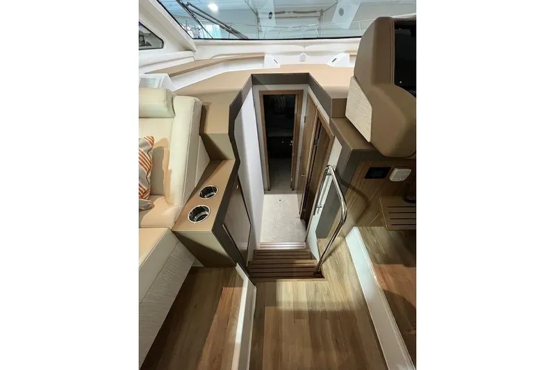  Yacht Photos Pics Interior view of 2026 Cruisers Yachts 42 Cantius, featuring elegant wood flooring.