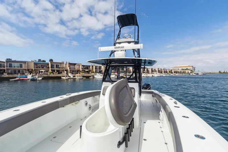 Bangarang Yacht Photos Pics 2022 Freeman 34VH boat on water, with modern design and coastal background.