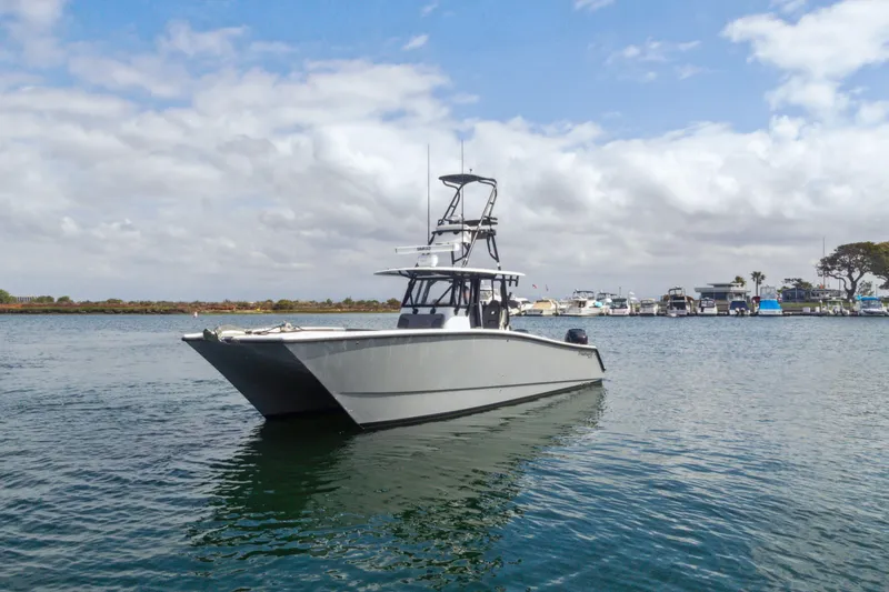 Bangarang Yacht Photos Pics 2022 Freeman 34VH boat on calm water with cloudy sky background.
