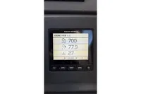 Volvo Penta engine display in 2024 Nimbus 305 Coupe, showing RPM and temperature.