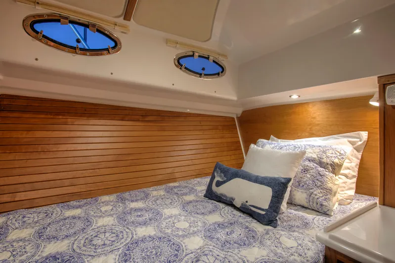 Call For Availability Yacht Photos Pics Interior of 2027 Back Cove 372 yacht with cozy bed.