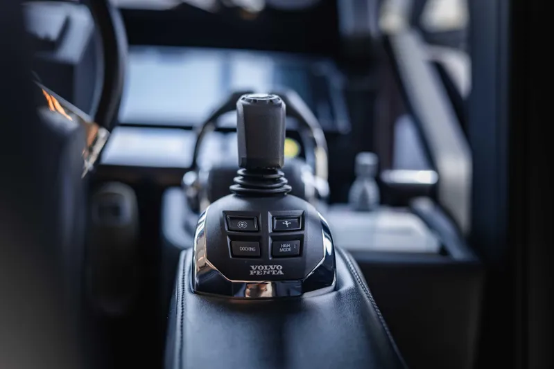  Yacht Photos Pics Joystick control in 2019 Cranchi E 52F yacht cockpit, featuring Volvo Penta system.