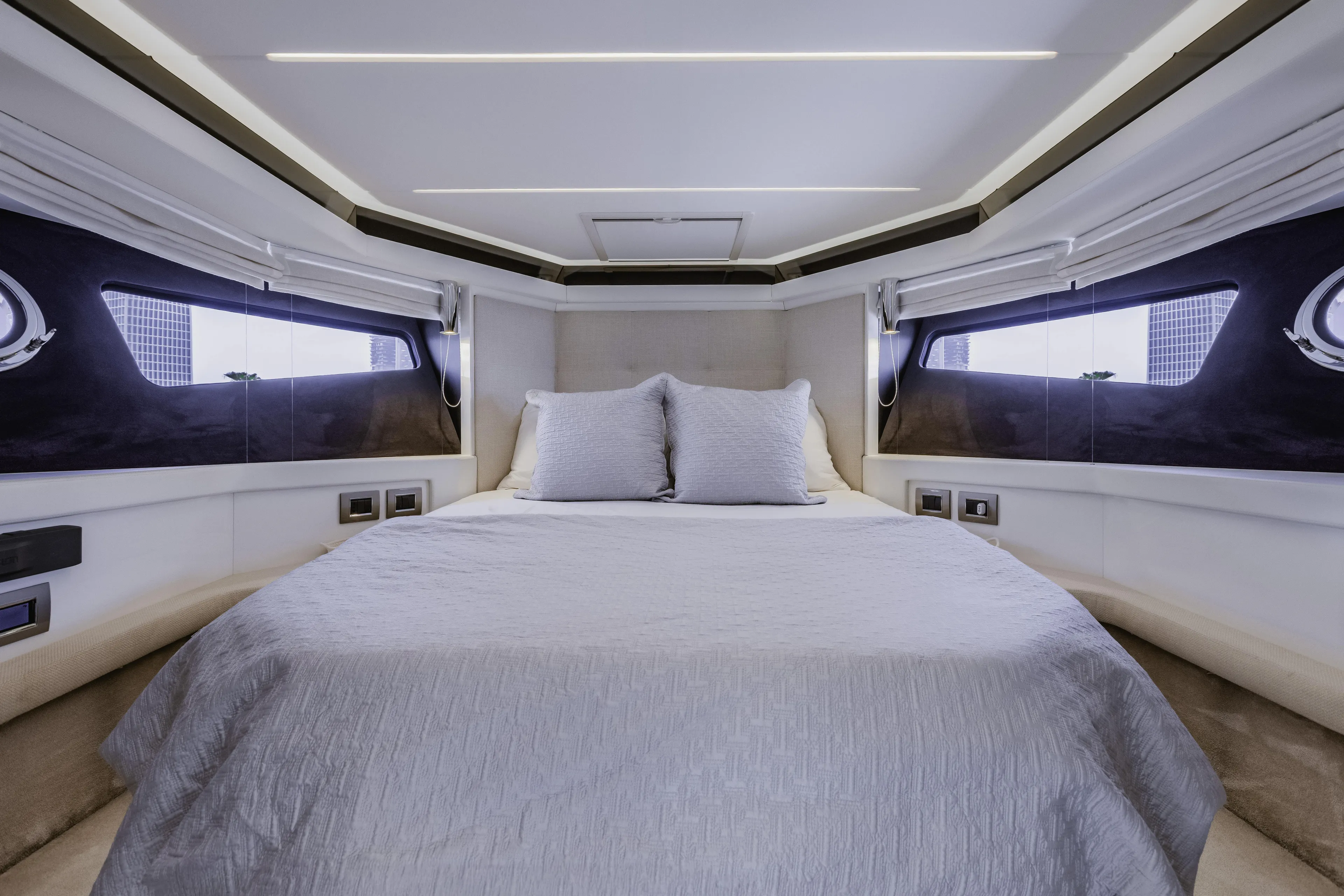  Yacht Photos Pics Luxurious bedroom interior of 2019 Cranchi E 52F yacht with modern design.
