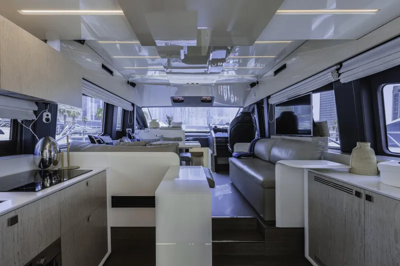  Yacht Photos Pics Luxurious interior of 2019 Cranchi E 52F yacht with modern furnishings and sleek design.