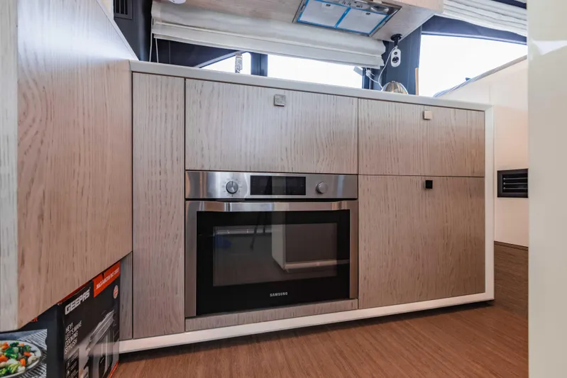  Yacht Photos Pics Modern kitchen in 2019 Cranchi E 52F yacht with Samsung oven.
