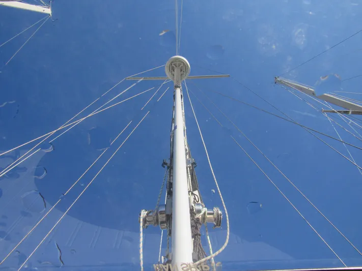 Silverado Yacht Photos Pics Mast and rigging of 2009 Custom Pilothouse Cutter against clear blue sky.