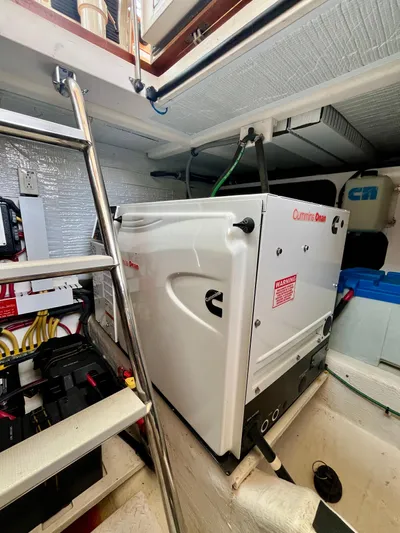 Serendipity II Yacht Photos Pics Engine room of 2010 Sabre 40 Sedan with Cummins Onan generator.
