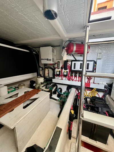 Serendipity II Yacht Photos Pics Engine room of a 2010 Sabre 40 Sedan with electrical panels and equipment.