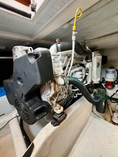 Serendipity II Yacht Photos Pics Engine compartment of a 2010 Sabre 40 Sedan, showcasing detailed mechanical components.