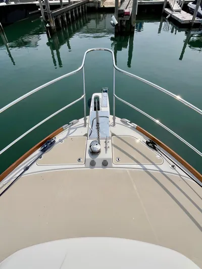 Serendipity II Yacht Photos Pics Bow view of 2010 Sabre 40 Sedan yacht docked in marina.