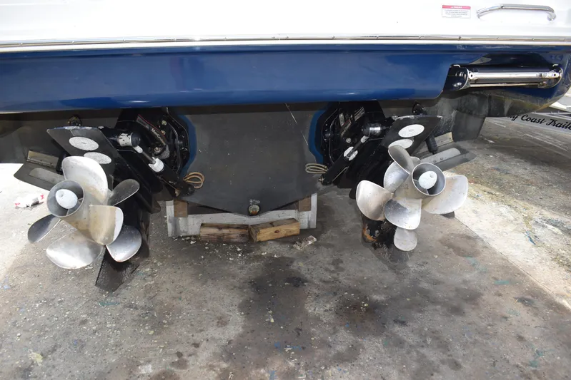 Windy Gale IV Yacht Photos Pics 2011 Sea Ray 310 Sundancer boat propellers on display in a maintenance area.