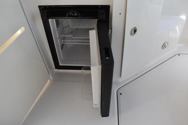 Windy Gale IV Yacht Photos Pics Open mini fridge on 2011 Sea Ray 310 Sundancer boat deck.