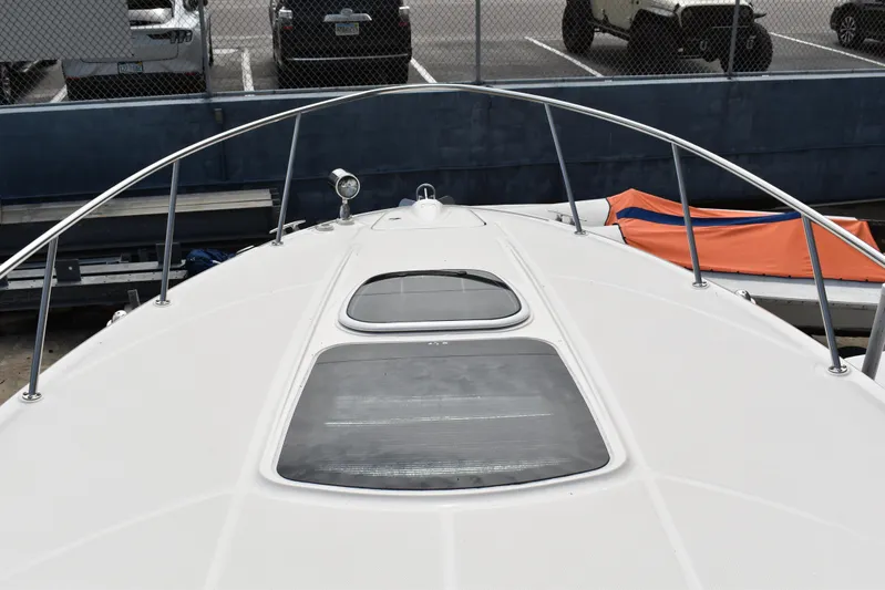Windy Gale IV Yacht Photos Pics 2011 Sea Ray 310 Sundancer boat deck with hatches, docked in marina.