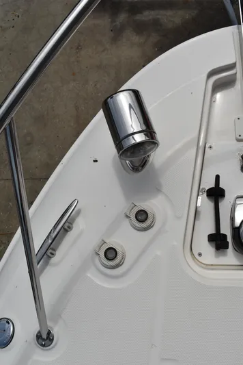 Windy Gale IV Yacht Photos Pics 2011 Sea Ray 310 Sundancer boat deck with chrome fixtures and controls.