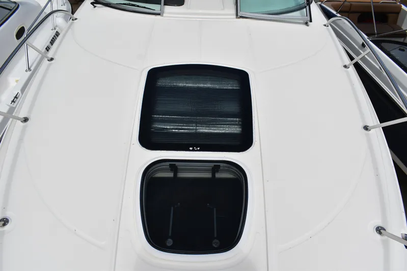 Windy Gale IV Yacht Photos Pics 2011 Sea Ray 310 Sundancer boat deck with skylights and railing.