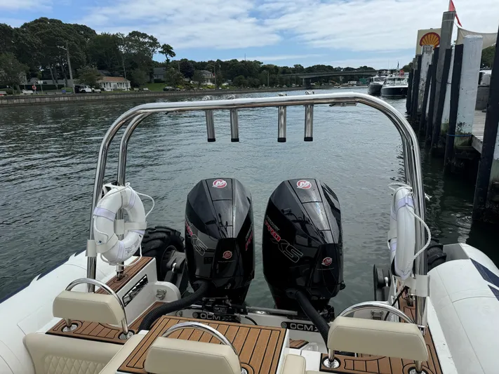  Yacht Photos Pics 2023 Ocean Craft Marine 9M Amphibious boat with dual engines on a calm river.