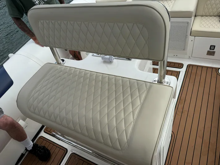  Yacht Photos Pics 2023 Ocean Craft Marine 9M Amphibious boat with quilted seating and teak flooring.