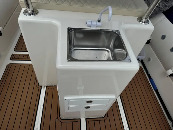  Yacht Photos Pics 2023 Ocean Craft Marine 9M Amphibious boat sink with wooden deck flooring.
