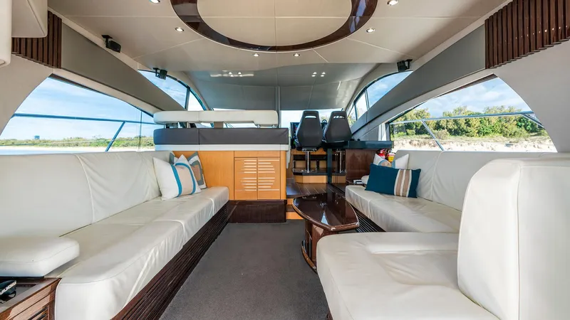 Cloud Catcher Yacht Photos Pics Luxurious interior of 2014 Sunseeker Manhattan 55 yacht with elegant seating and modern design.