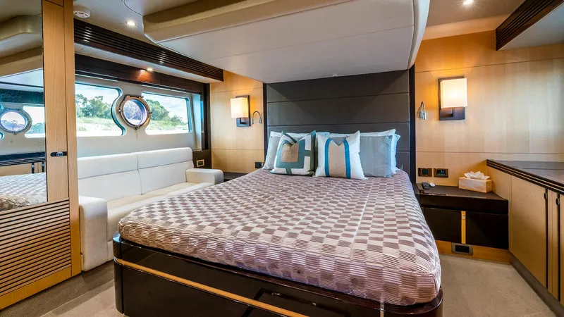 Cloud Catcher Yacht Photos Pics Luxurious bedroom interior of 2014 Sunseeker Manhattan 55 yacht with modern decor.