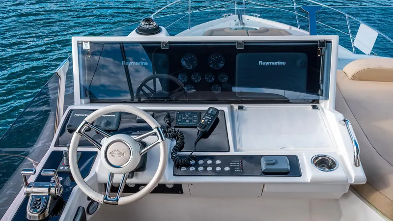 Cloud Catcher Yacht Photos Pics Helm of 2014 Sunseeker Manhattan 55 yacht with Raymarine navigation system.