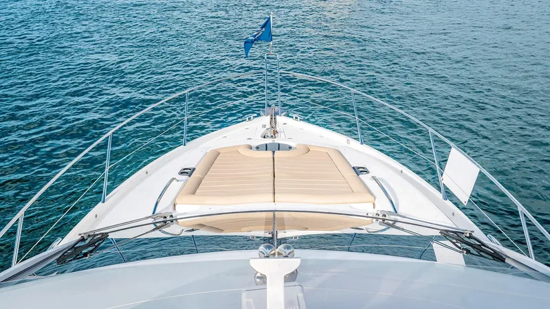 Cloud Catcher Yacht Photos Pics Bow view of 2014 Sunseeker Manhattan 55 yacht on open water.