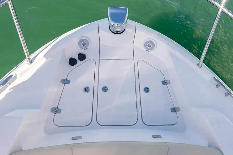  Yacht Photos Pics Manufacturer Provided Image: Bow of 2025 Regal 38 FXO boat with storage compartments and speakers.