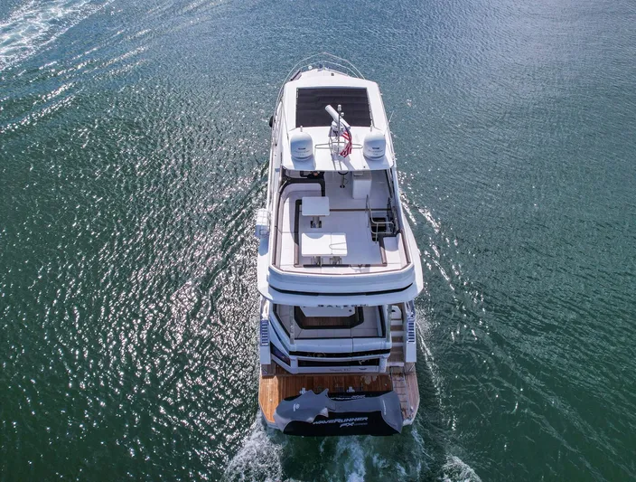 Gold Star Yacht Photos Pics Aerial view of 2020 Galeon 640 Fly yacht cruising on open water.