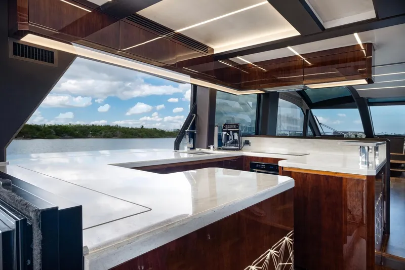 Gold Star Yacht Photos Pics Luxurious interior of 2020 Galeon 640 Fly yacht with modern kitchen design.