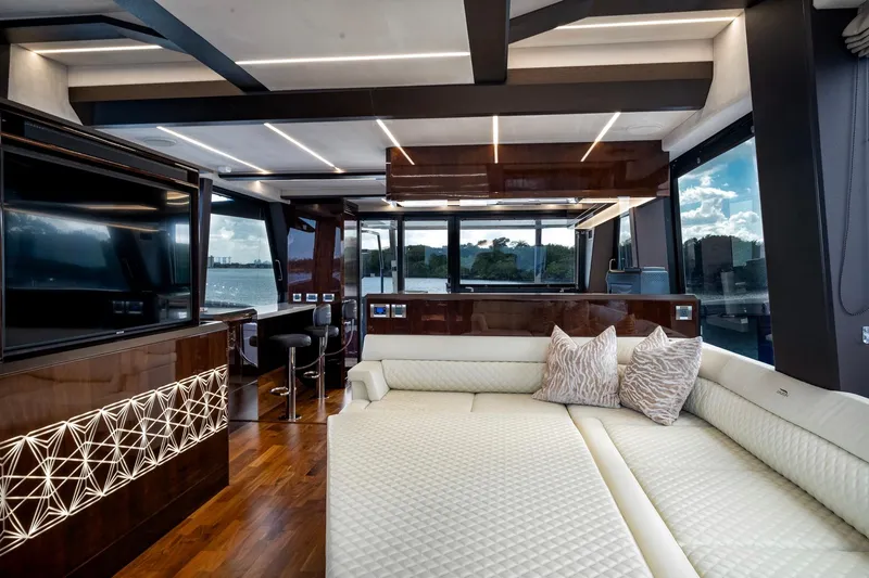 Gold Star Yacht Photos Pics Luxurious interior of 2020 Galeon 640 Fly yacht with modern design and plush seating.