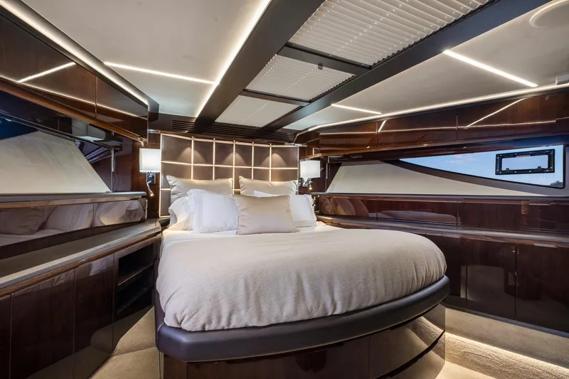 Gold Star Yacht Photos Pics Luxurious bedroom interior of 2020 Galeon 640 Fly yacht with modern design and ambient lighting.