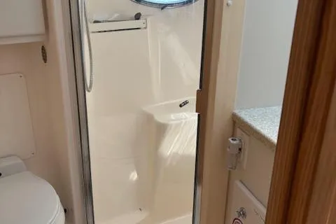  Yacht Photos Pics 2000 Tiara Yachts 4100 Open bathroom with shower and toilet.