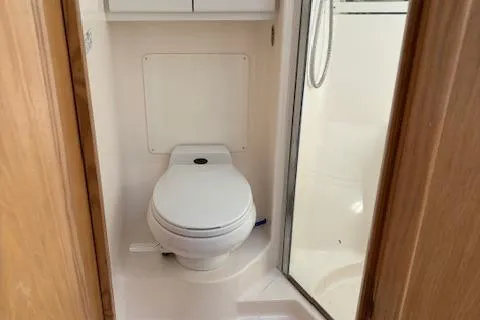  Yacht Photos Pics Tiara Yachts 4100 Open 2000 model bathroom with toilet and shower.