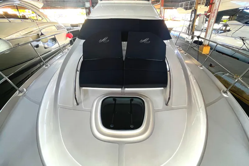  Yacht Photos Pics 2009 Sea Ray Sedan Bridge yacht with sleek deck and cushioned seating.