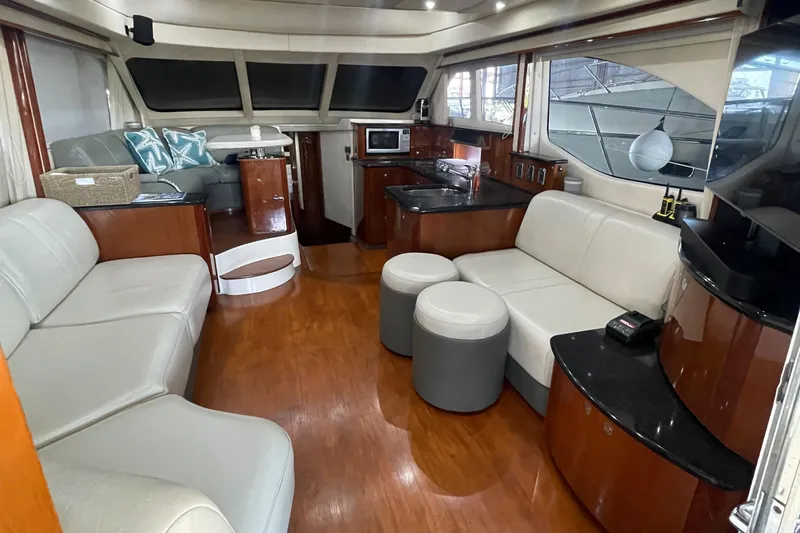  Yacht Photos Pics Luxurious interior of 2009 Sea Ray Sedan Bridge yacht with modern furnishings.