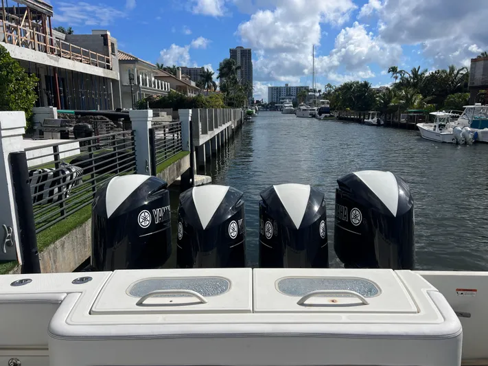  Yacht Photos Pics 2017 Hydra-Sports 4200 Siesta with four Yamaha outboard engines docked by a canal.