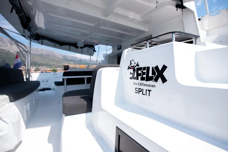  Yacht Photos Pics 2024 Lagoon 450 F catamaran interior with "Felix" branding, docked in Split.