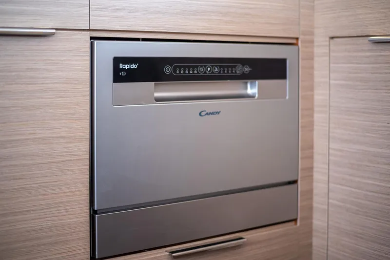  Yacht Photos Pics Built-in Candy Rapido dishwasher in modern kitchen cabinetry.