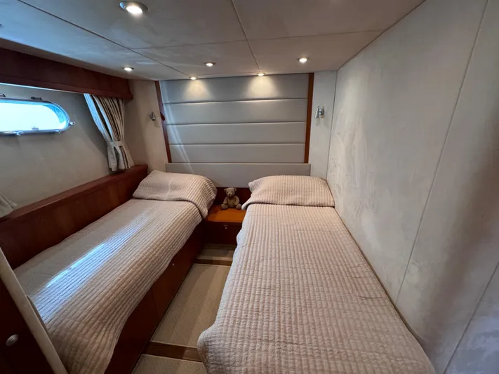  Yacht Photos Pics Twin cabin with cozy beds in 2008 Sunseeker Manhattan 70 yacht.